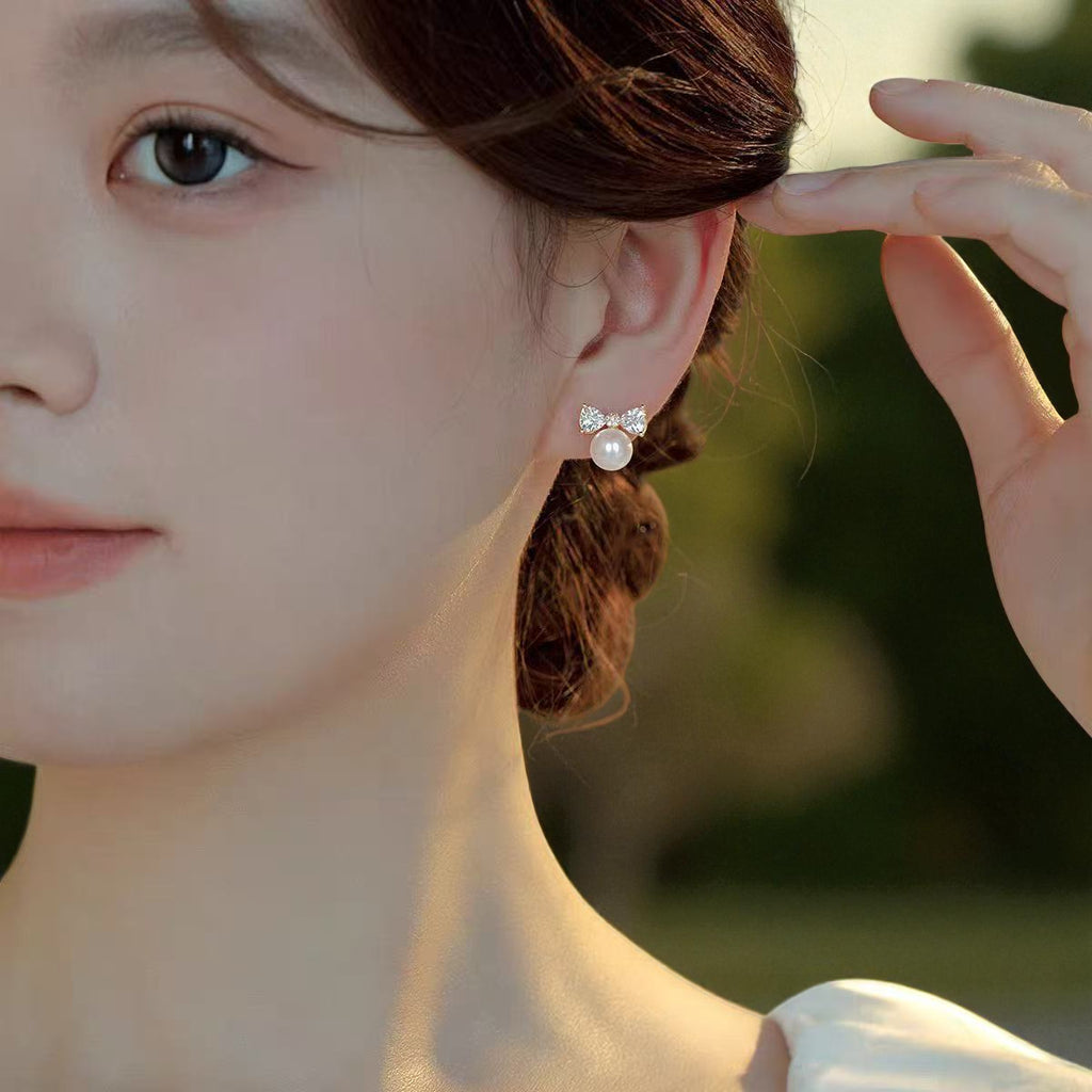 Ribbon Kiss Pearl Bow Stud Earrings