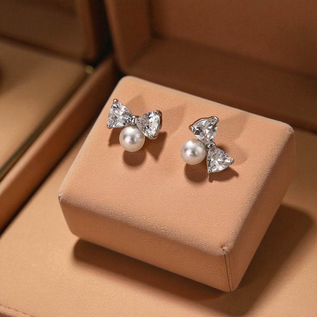 Ribbon Kiss Pearl Bow Stud Earrings