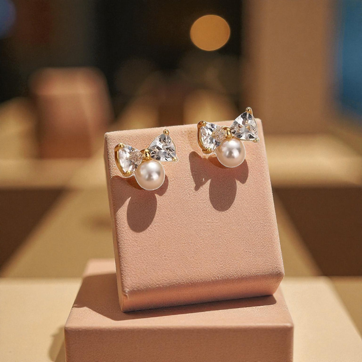 Ribbon Kiss Pearl Bow Stud Earrings